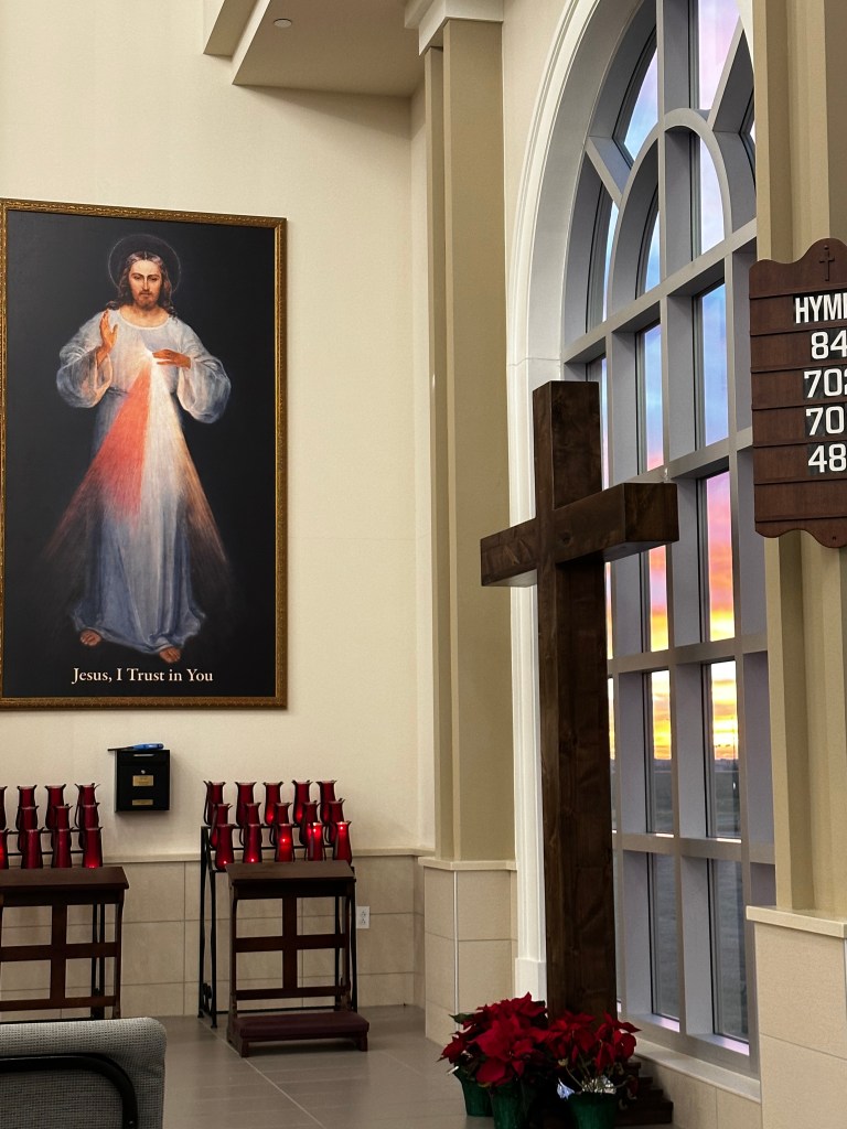 Image of the Divine Mercy portrait and sunrise.